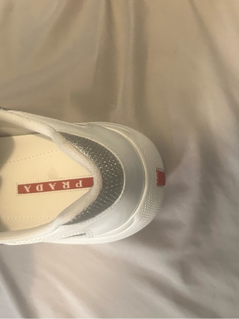 Prada White Slip-On Sneaker with Silver Mesh and Red Logo - Picture 2 of 14